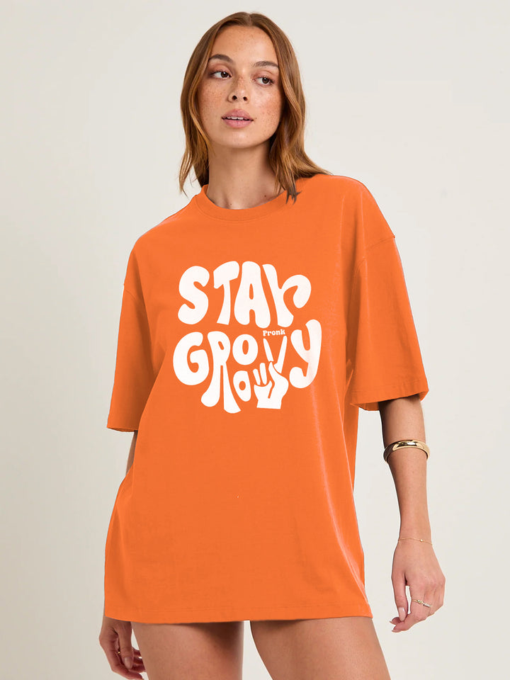 STAY GROOVY Women Graphic Oversized Printed T-Shirt